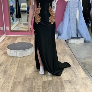 Elegant Black and Gold prom or pageant dress